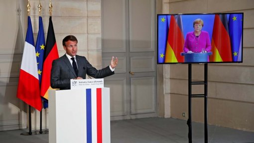 Covid-19: Merkel e Macron apoiam estratégia de Bruxelas em matéria de vacinas